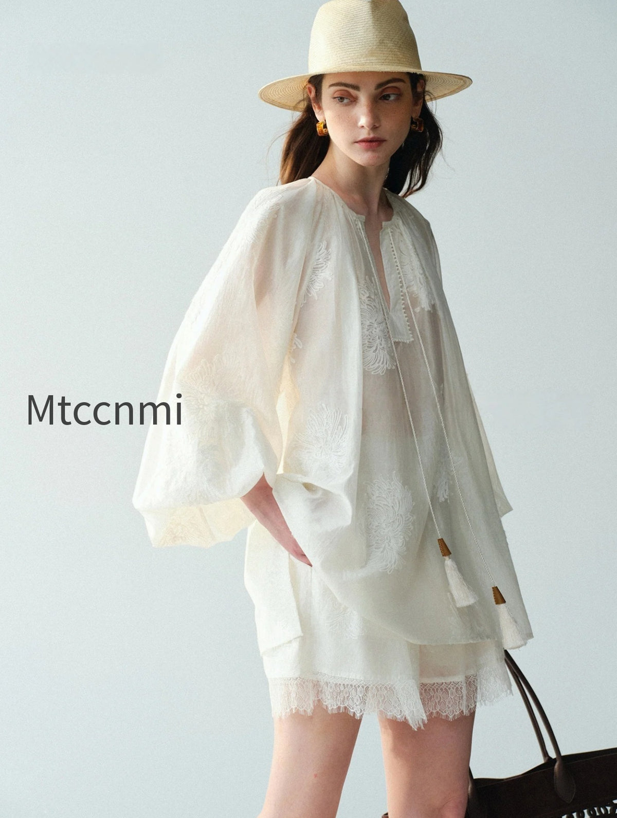 heavy-embroidered-lyocell-v-neck-blouse-lantern-sleeve-tassel-top
