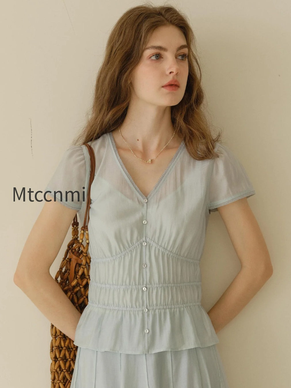 bella-v-neck-smocking-blouse