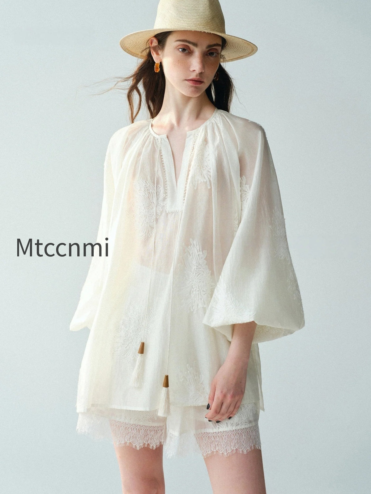 heavy-embroidered-lyocell-v-neck-blouse-lantern-sleeve-tassel-top